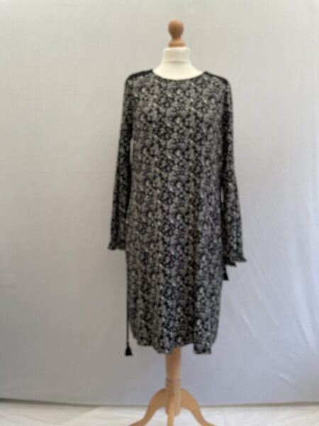 comfortable floral black and white knee length modest dress in soft stretch jersey with fabric tie belt and long sleeves