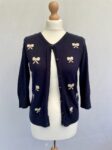 D.P navy knit bow cardigan